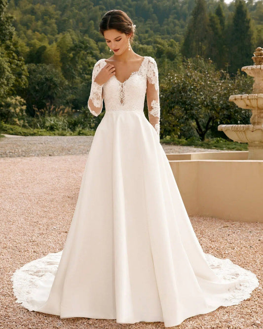 long sleeve lace bodice satin a-line wedding dress - image 1