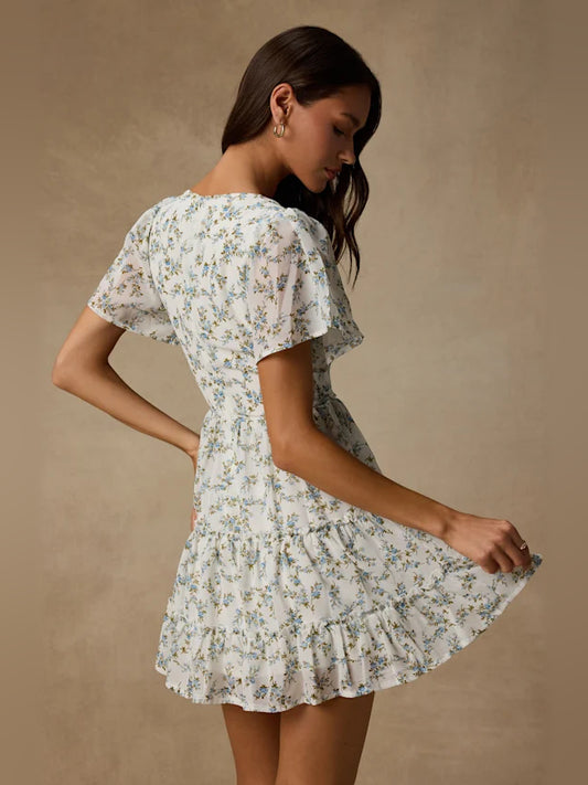 White Floral mini homecoming dress, alternate view showing the bodice and skirt