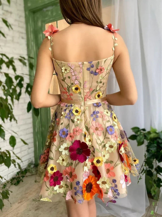 Beige mini homecoming dress, back view showing the rear of the dress
