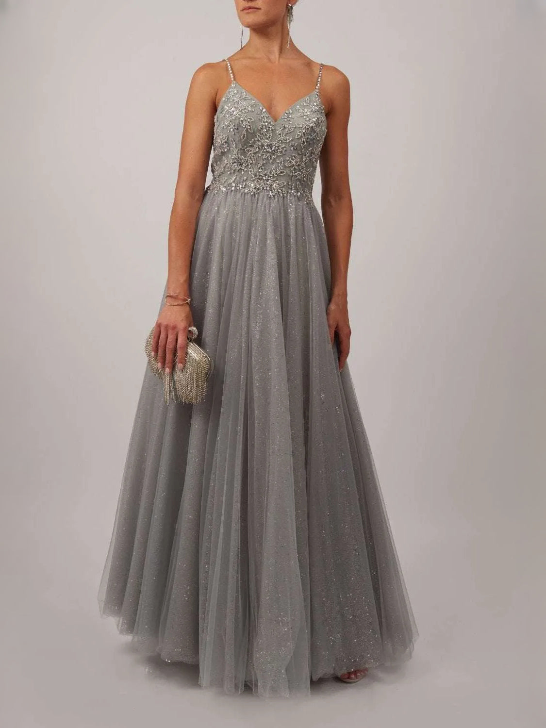 Silver floor-length prom dress, back view showing the rear of the dress