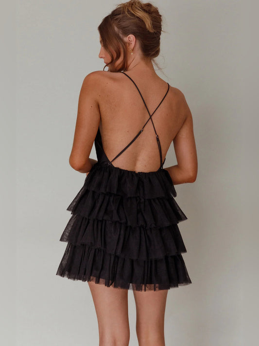 Black mini homecoming dress, back view showing the rear of the dress