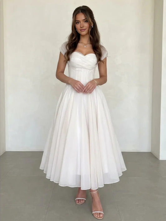 Ivory tea-length wedding dress, alternate view showing the bodice and skirt