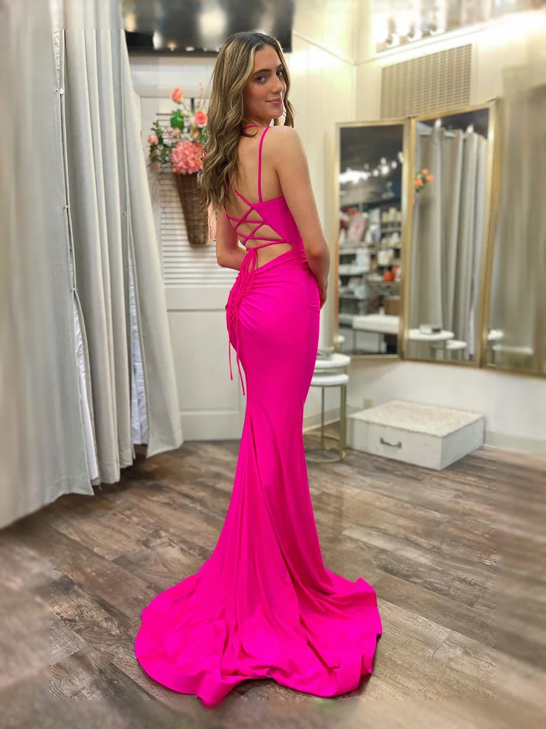 Hot Pink floor-length prom dress, back view showing the rear of the dress