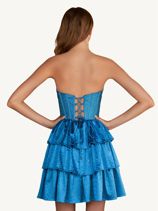 Blue mini homecoming dress, back view showing the rear of the dress