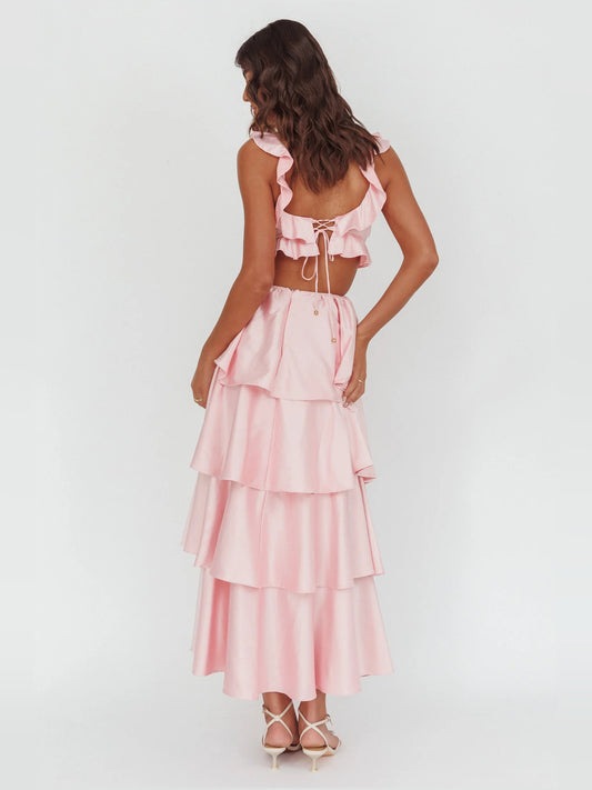 Blush a-line maxi formal dress with tiered skirt, full-length back view