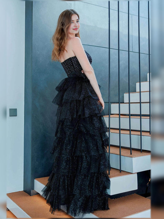 Black a-line floor-length formal dress with ruffle details, alternate view
