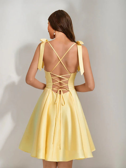 Marigold short homecoming dress, back view showing the rear of the dress