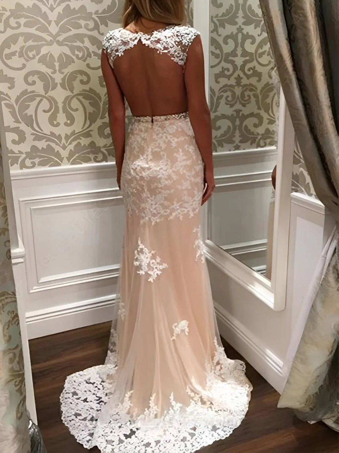 Champagne floor-length prom dress, back view showing the rear of the dress