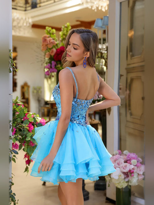 Blue mini homecoming dress, back view showing the rear of the dress