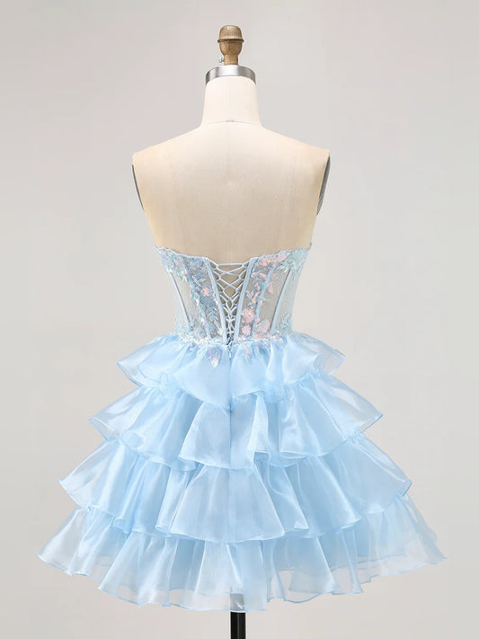 Light Pink short homecoming dress, back view showing the rear of the dress