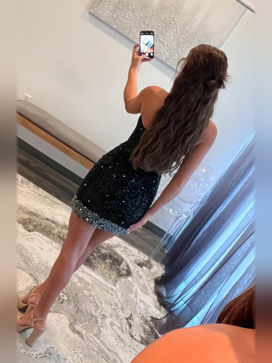 Black mini homecoming dress, back view showing the rear of the dress