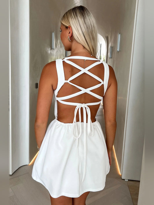 Ivory white mini homecoming dress, back view showing the rear of the dress