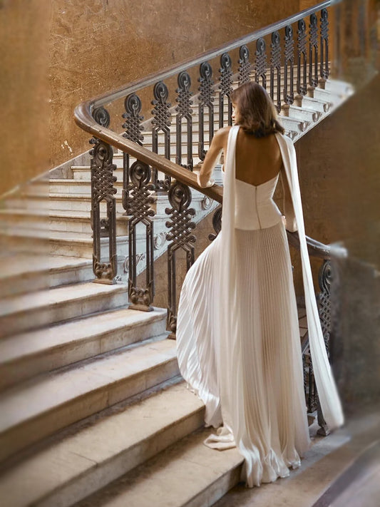 Ivory floor-length wedding dress, back view showing the rear of the dress