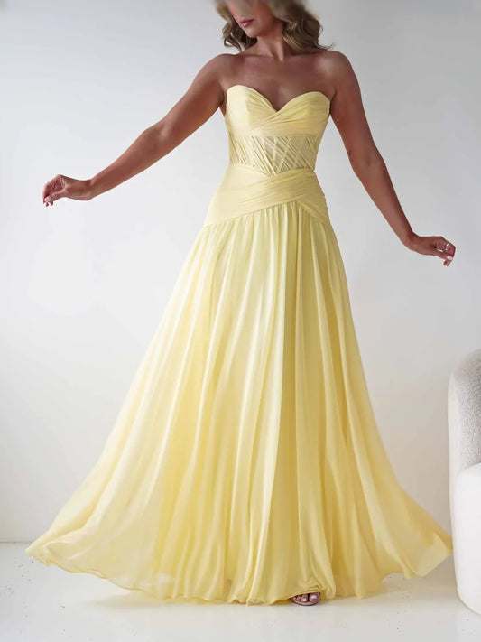 Yellow floor-length prom dress, alternate view showing the bodice and skirt