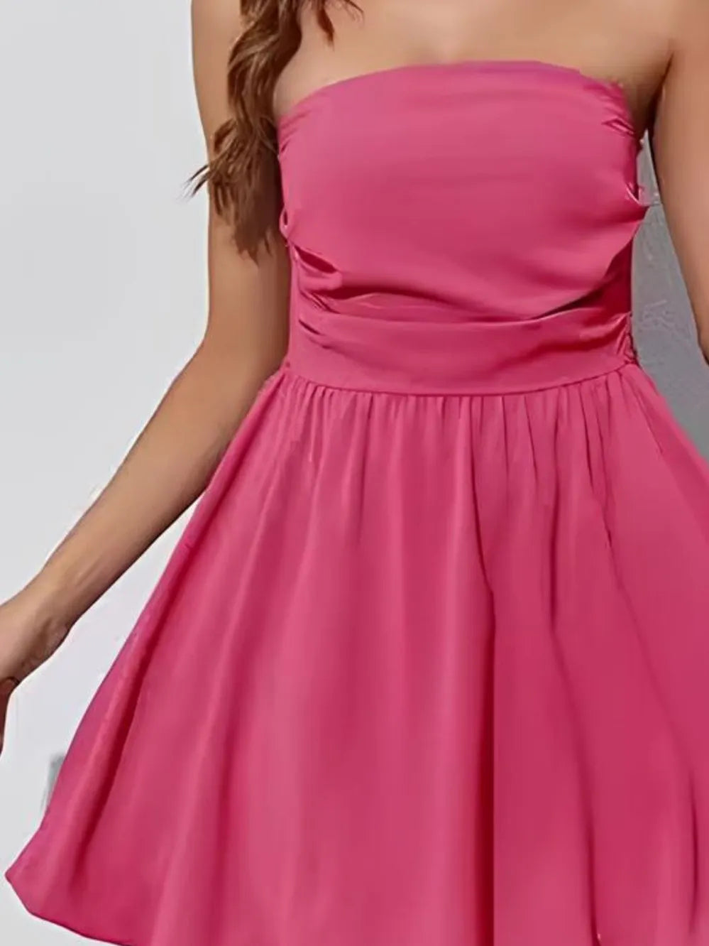 Pink mini homecoming dress, alternate view showing the dress shape and hem