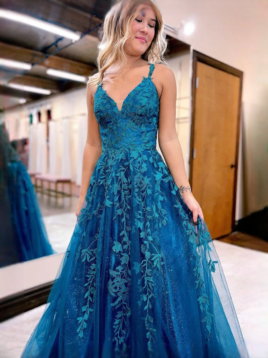 Teal floor-length prom dress, alternate view showing the dress shape and hem