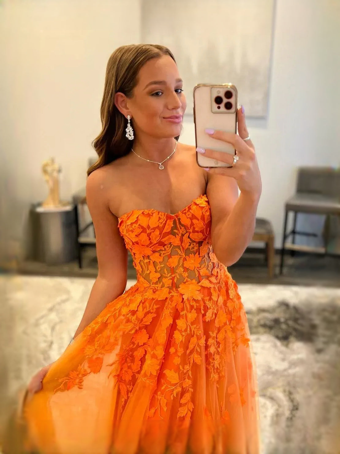 Orange maxi prom dress, back view showing the rear of the dress from another angle