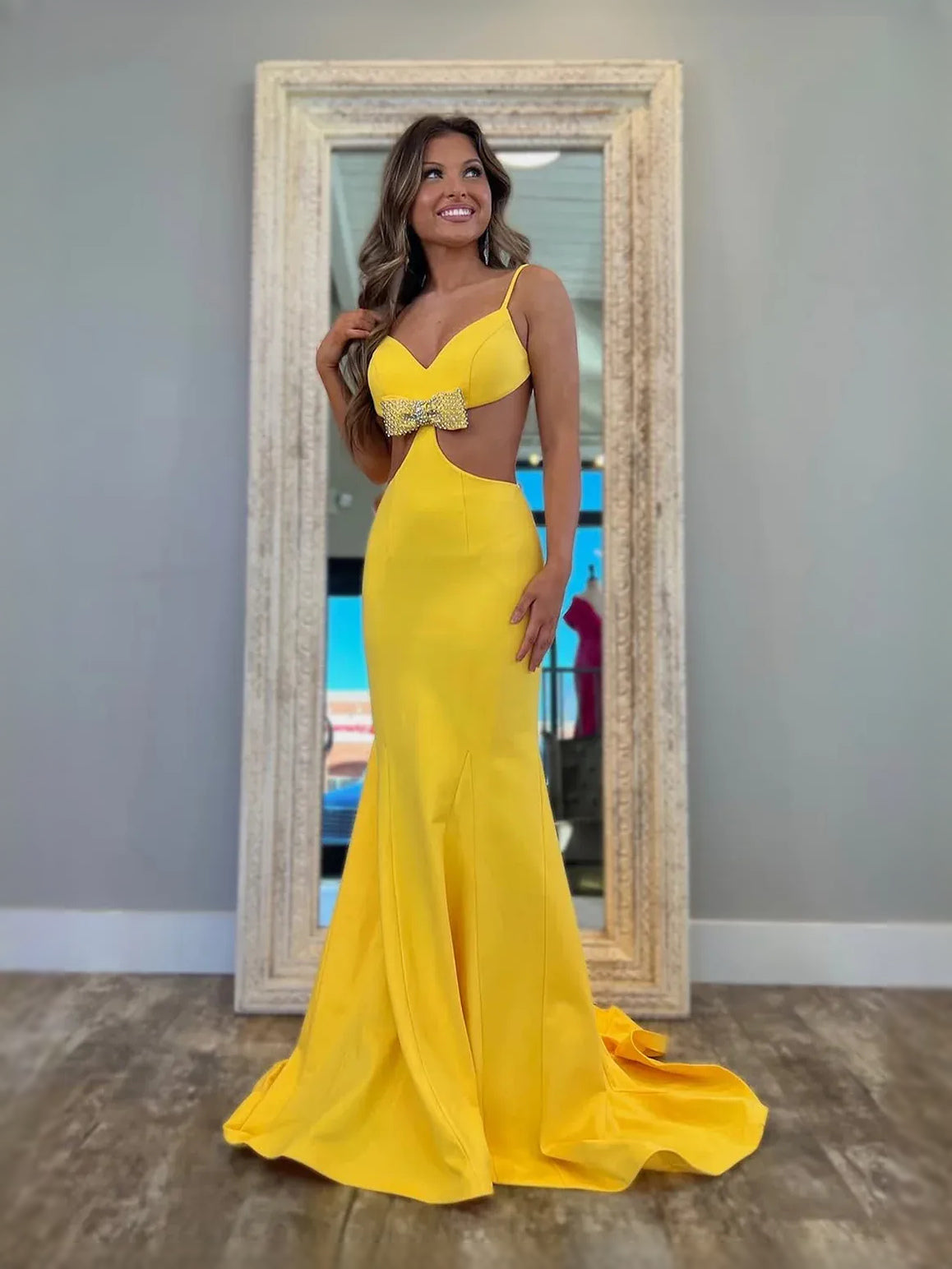 Yellow floor-length prom dress, alternate view showing the dress shape and hem