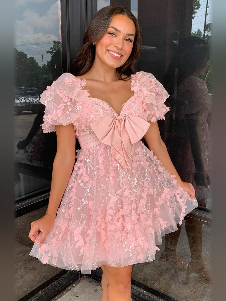 Blush Pink short homecoming dress, alternate view showing the dress shape and hem