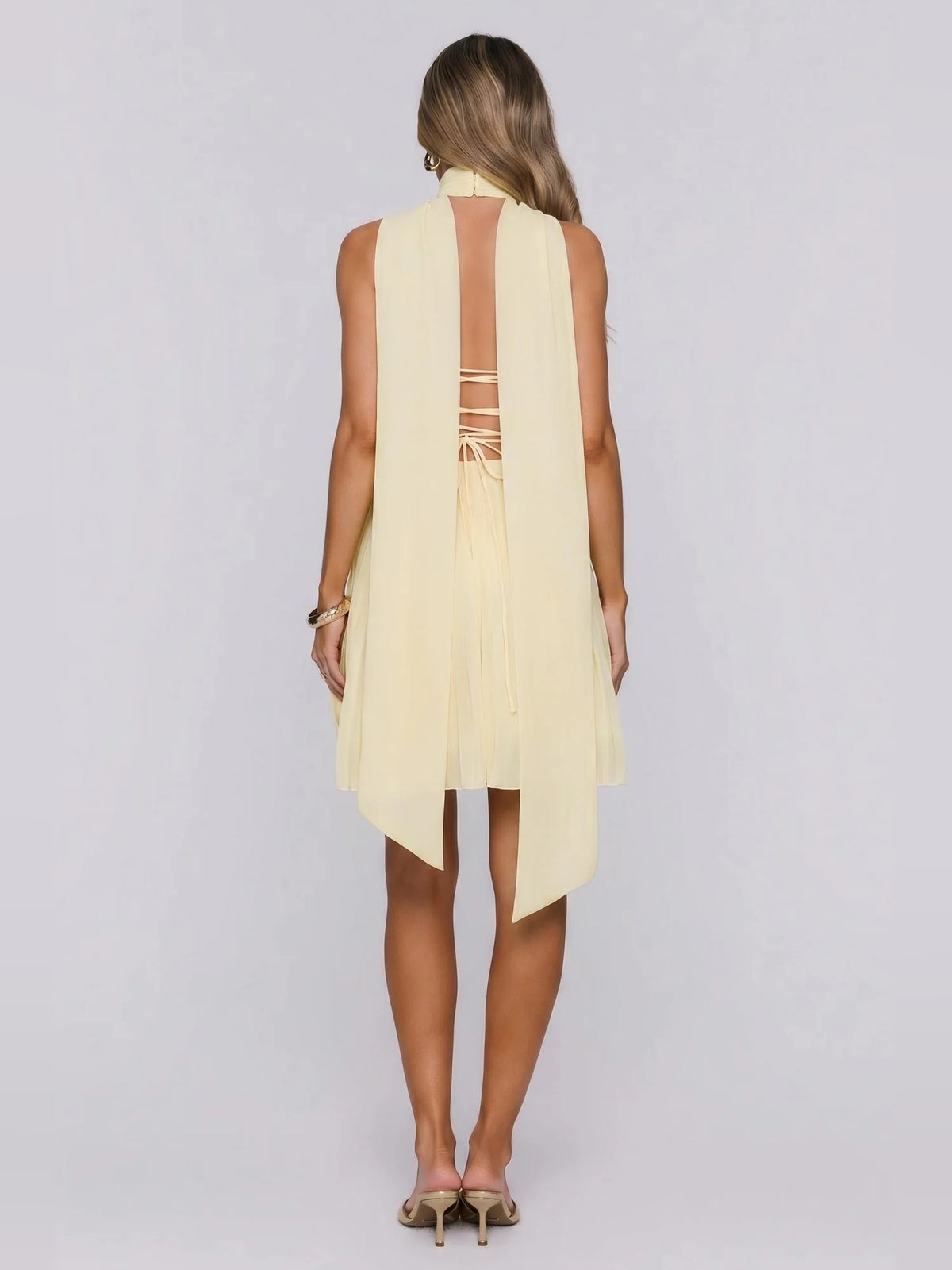 Yellow mini homecoming dress, alternate view showing the overall dress design
