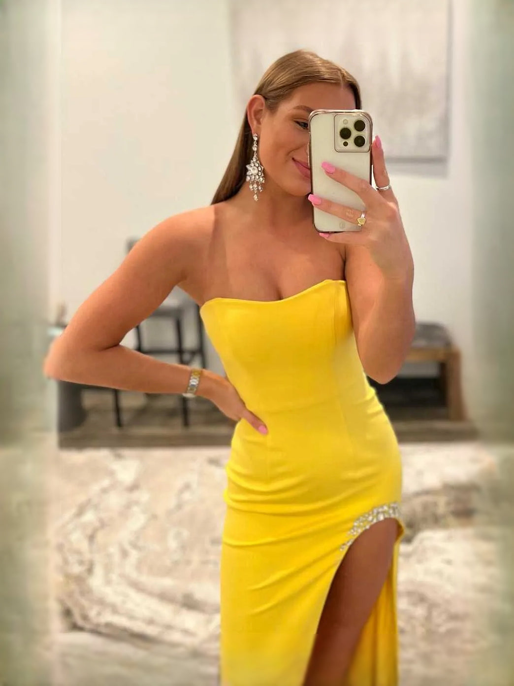Yellow maxi prom dress, back view showing the rear of the dress in an additional pose