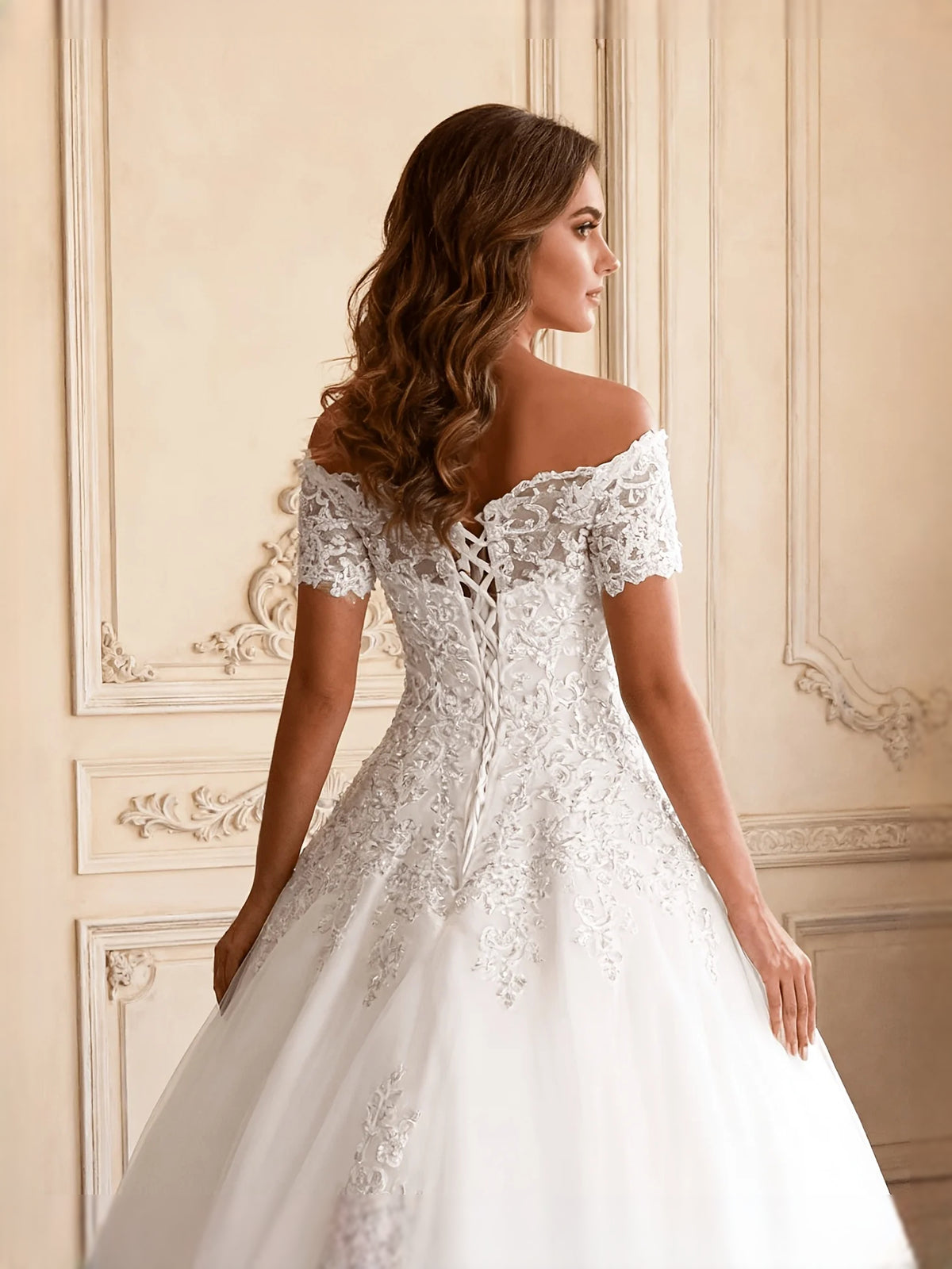 Ivory short wedding dress, alternate view showing the skirt and hem
