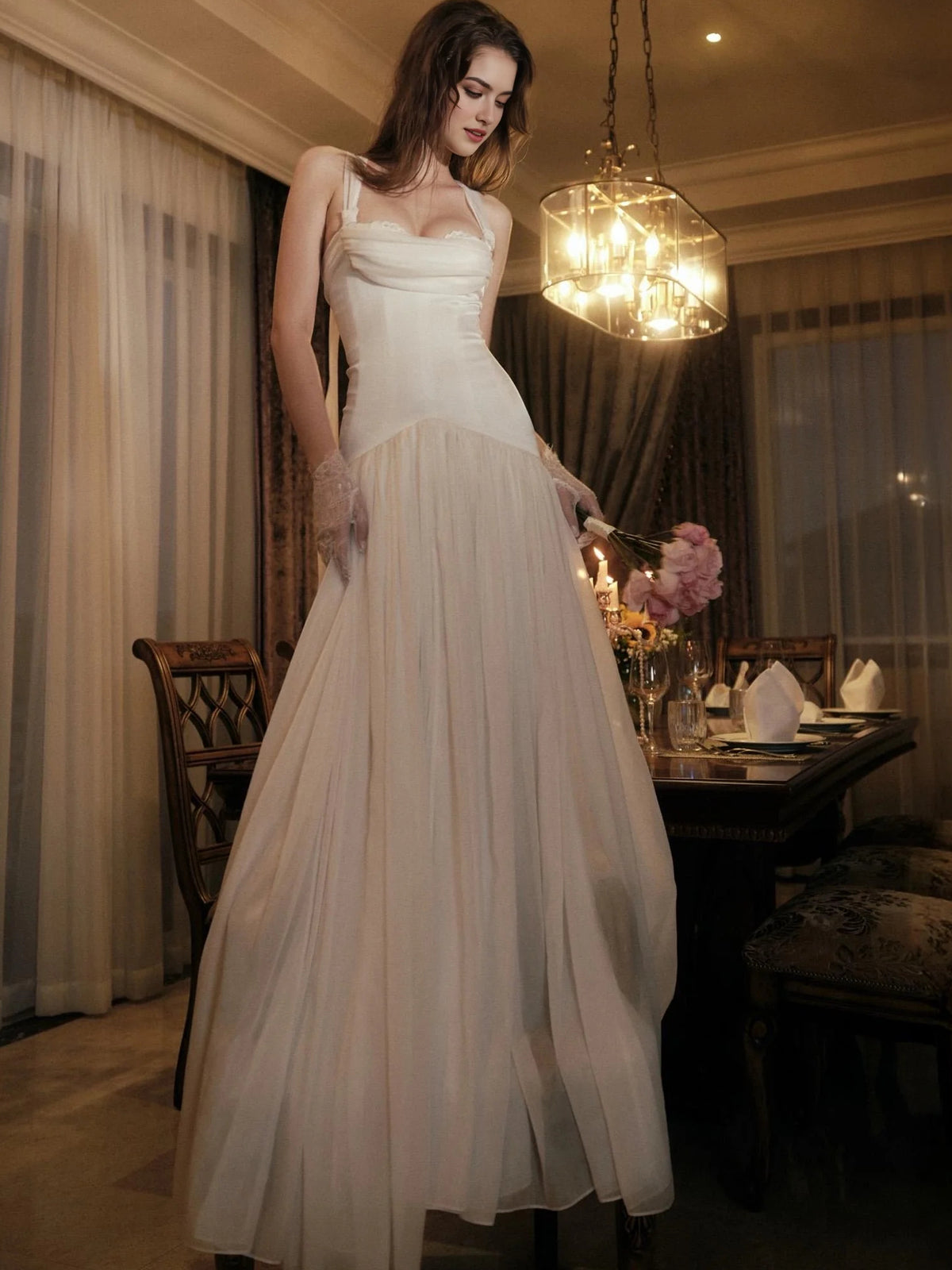 Ivory floor-length wedding dress, alternate view showing the skirt and hem