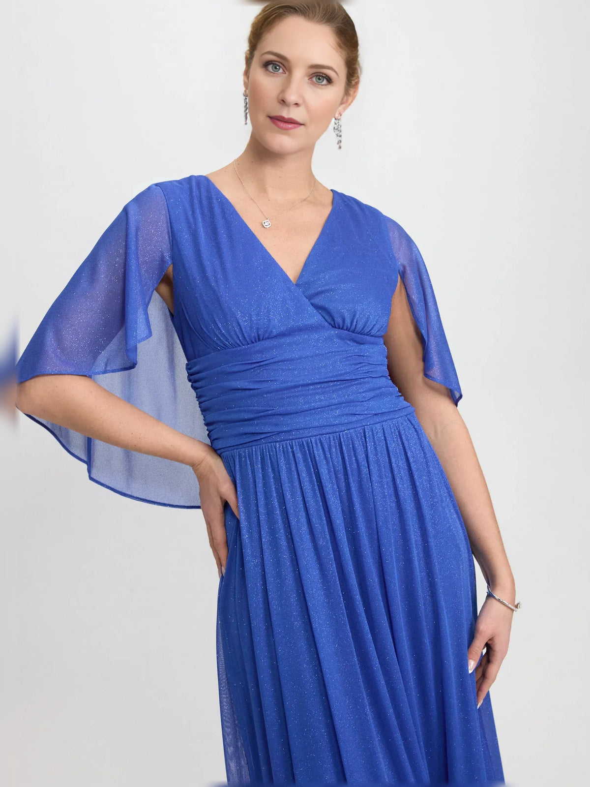 Blue floor-length mother of the bride dress, alternate view showing the skirt and hem