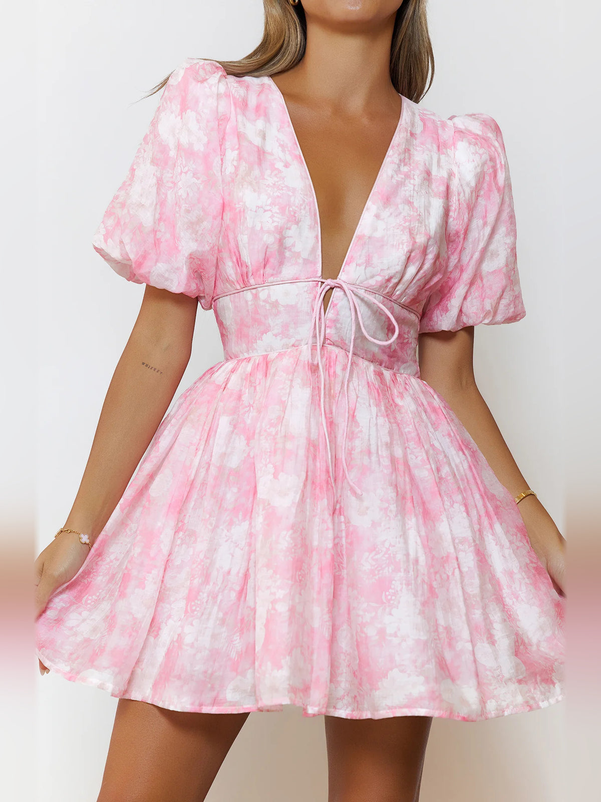 Pink mini homecoming dress, alternate view showing the skirt and hem