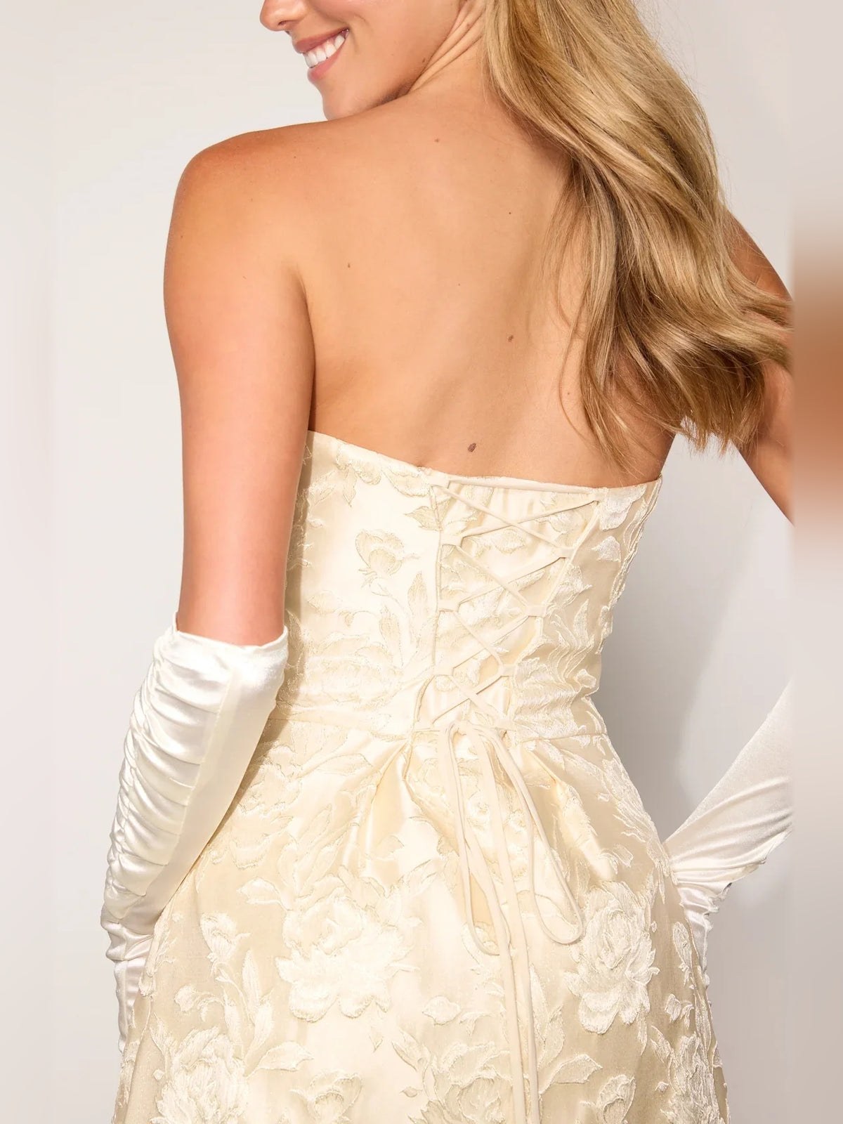 Gold mini homecoming dress, alternate view showing the skirt and hem