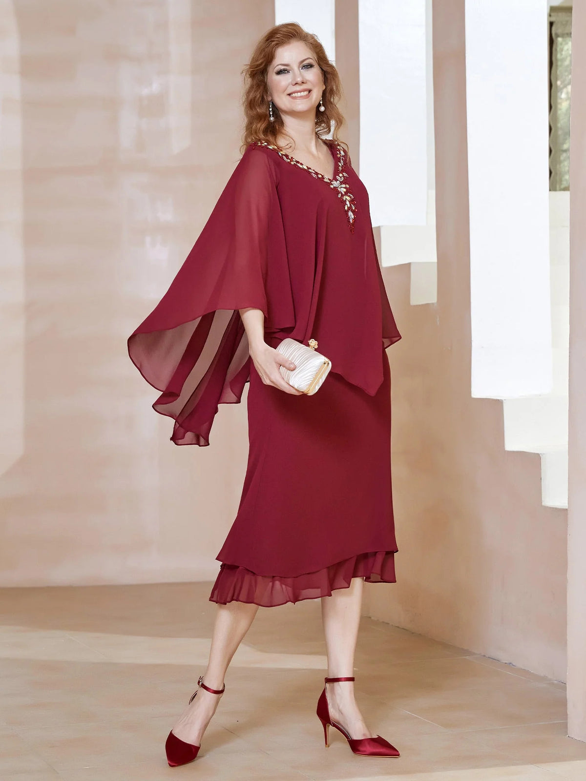 Burgundy midi mother of the bride dress, alternate view showing the skirt and hem