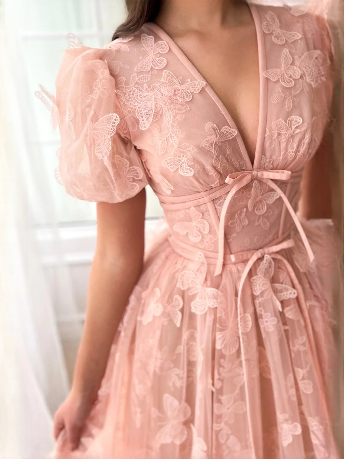 Peach floor-length prom dress, alternate view showing the skirt and hem