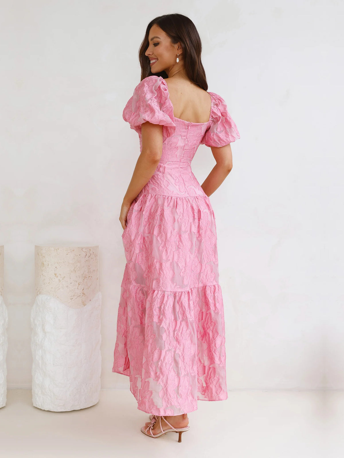 Pink a-line maxi formal dress with cutout detail, alternate view showing the hem