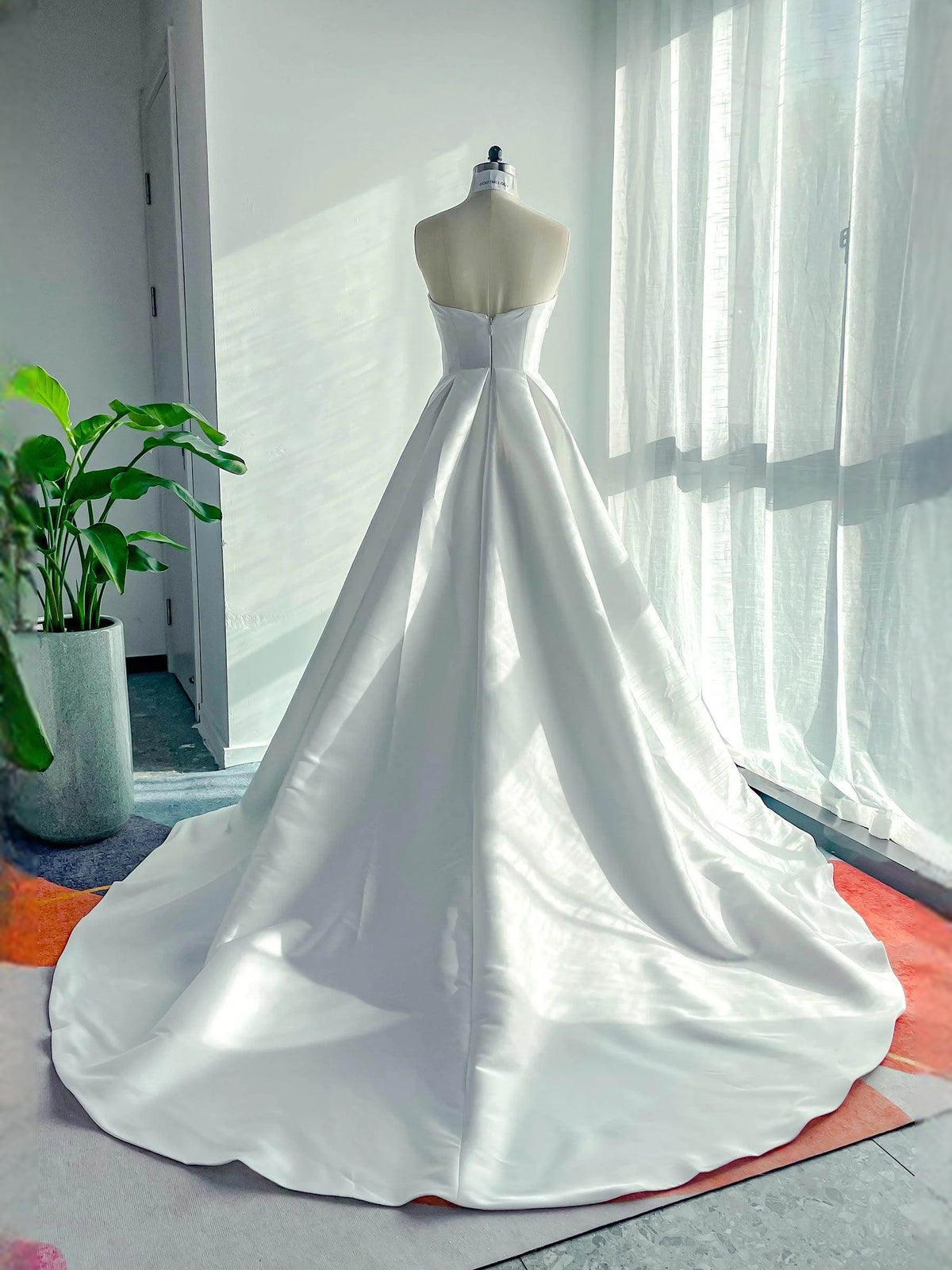 White floor-length wedding dress, alternate view showing the full-length profile