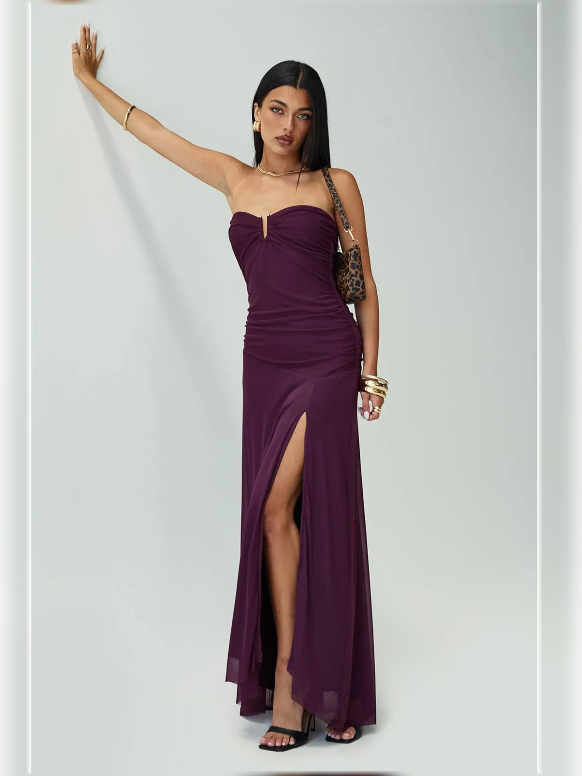 Purple bodycon floor-length formal dress with draping, alternate view showing the hem
