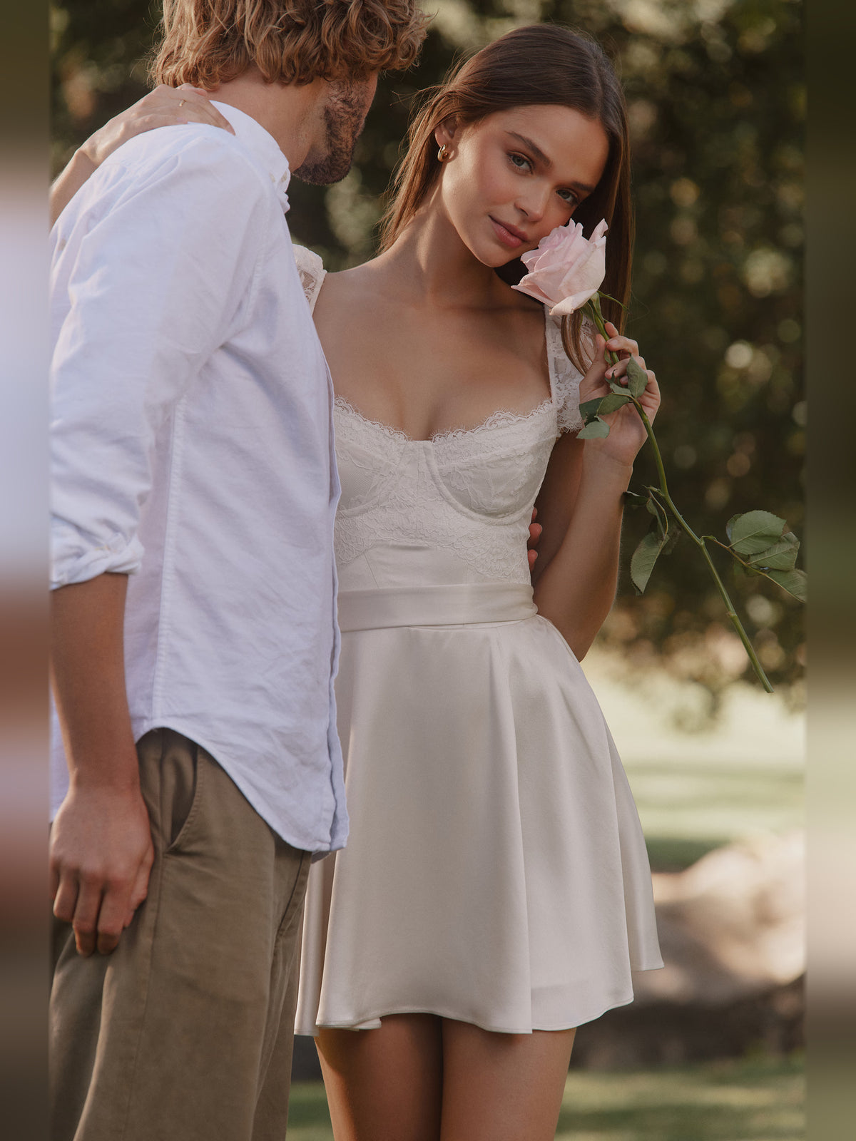 White mini homecoming dress, alternate view showing the full-length profile