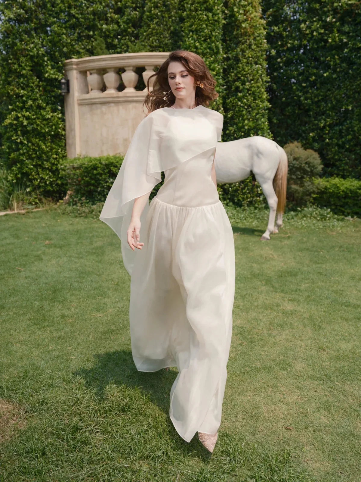 Ivory floor-length wedding dress, alternate view showing the bodice and skirt