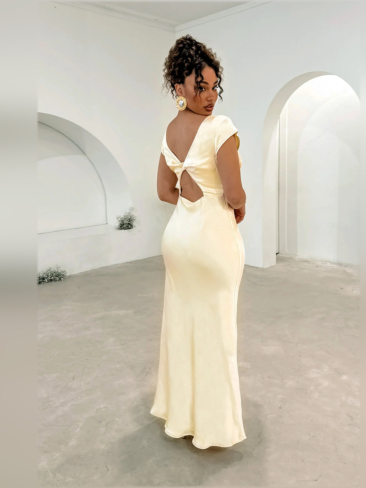 Yellow midi formal dress with V-neckline, alternate view showing the overall silhouette