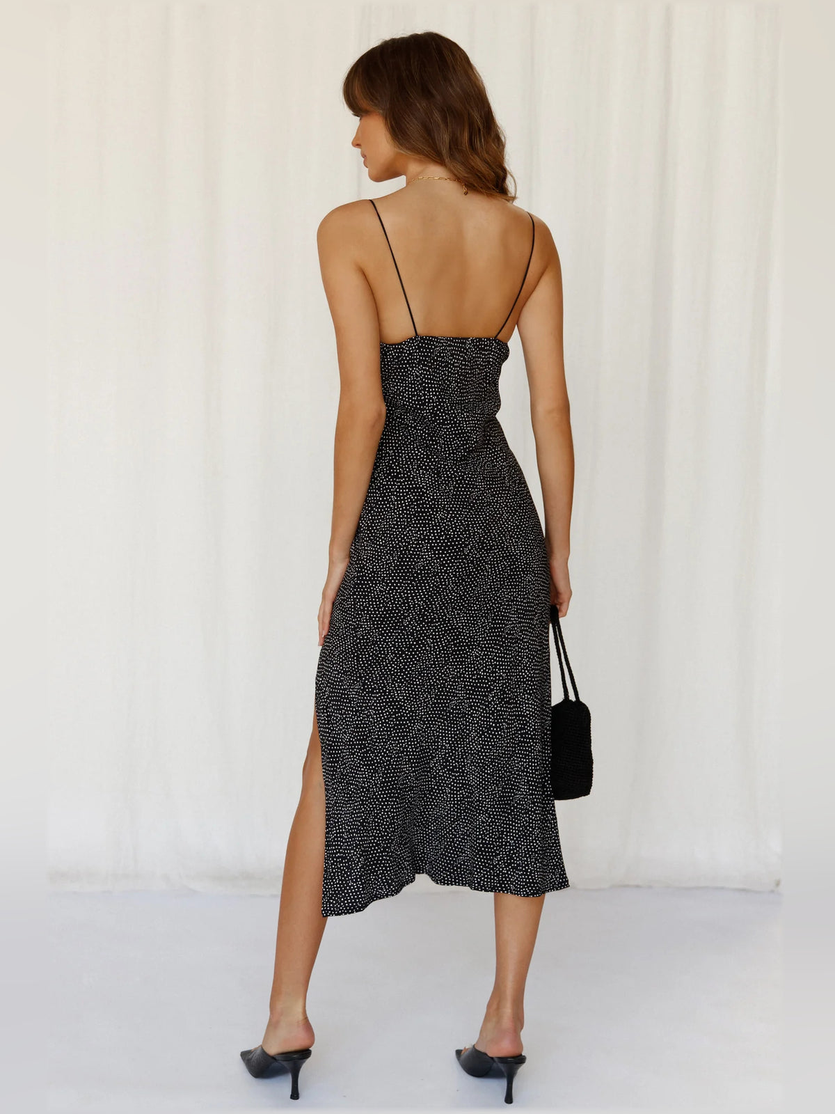 Black midi formal dress, alternate view showing the overall silhouette