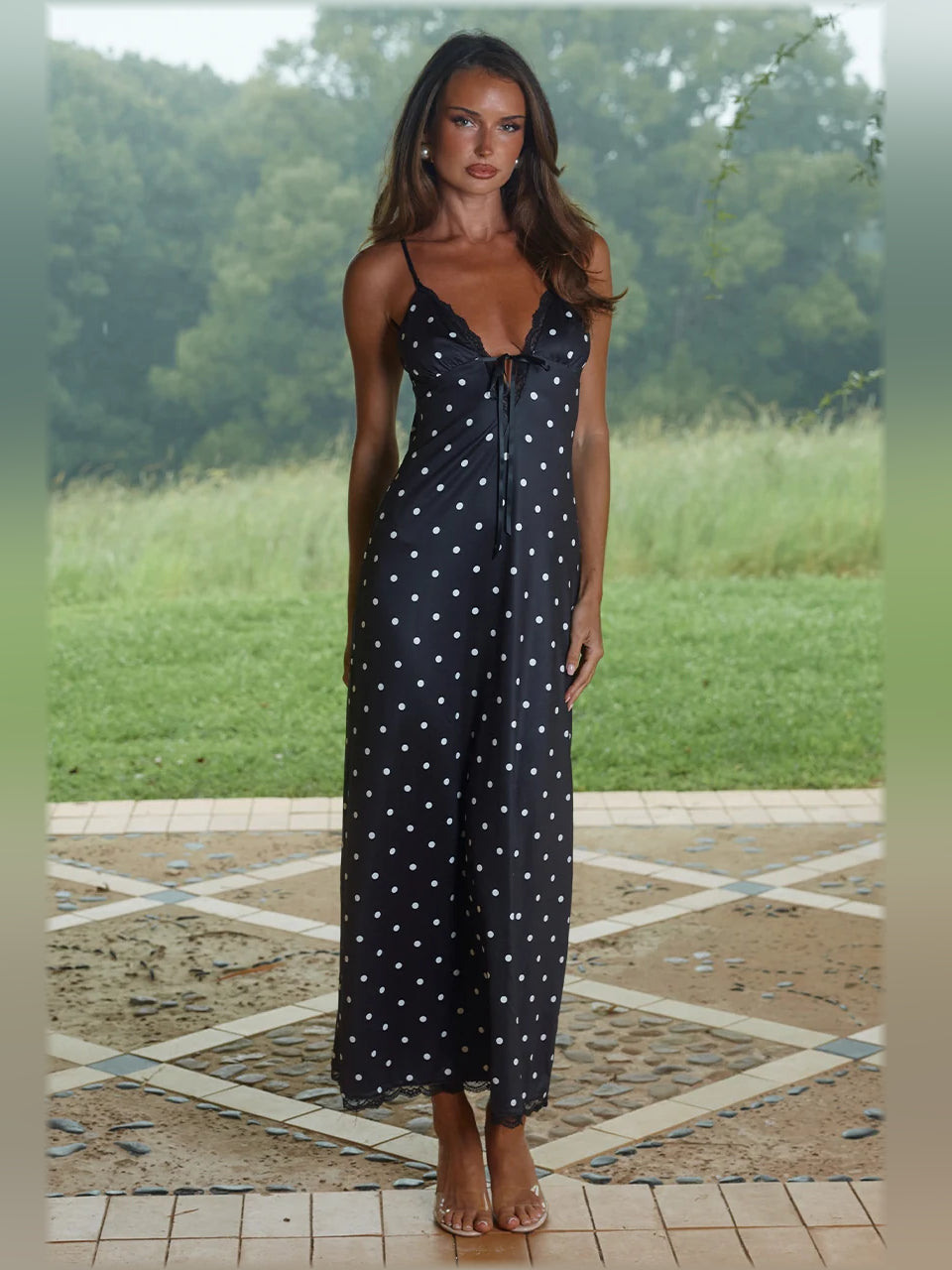 Black midi formal dress with printed pattern, alternate view showing the overall silhouette