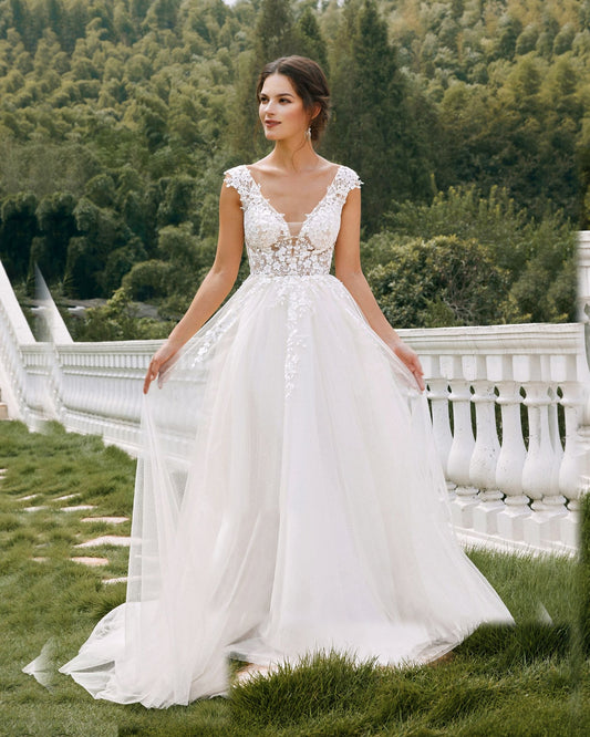 sleeveless v-neck lace tulle a-line wedding dress - image 1