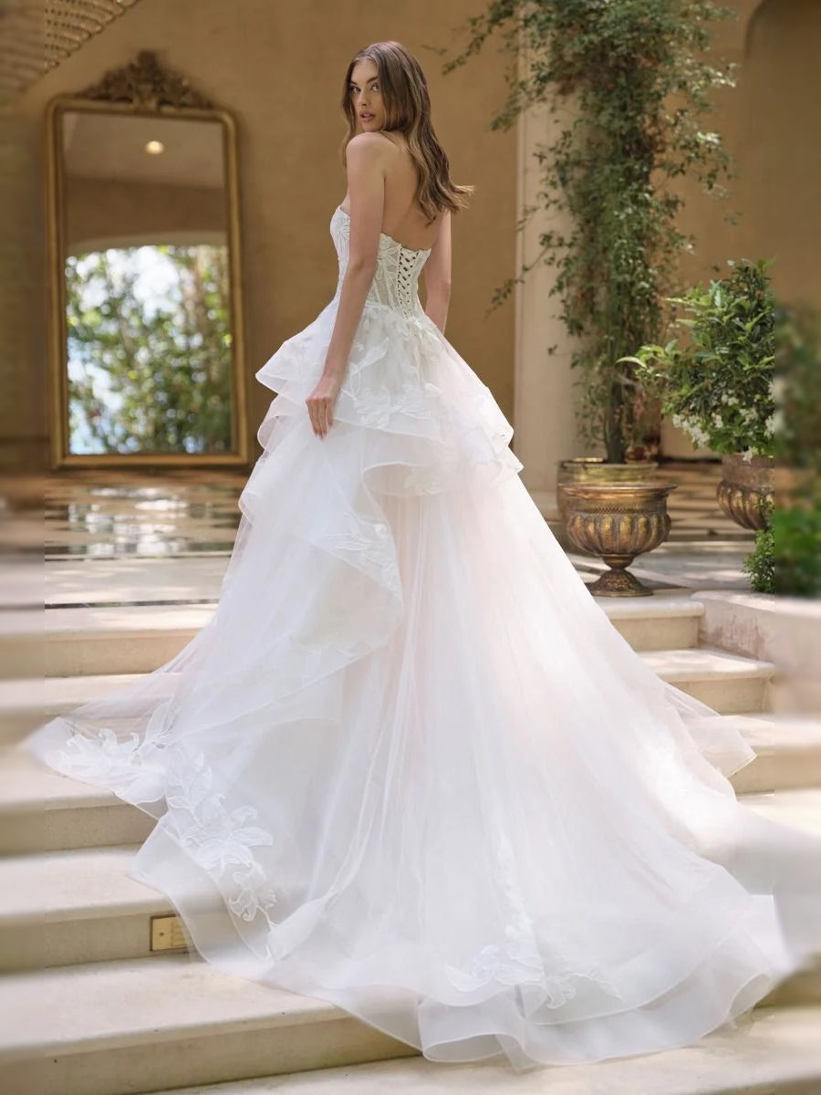 Ivory floor-length wedding dress, front view showing the a-line silhouette