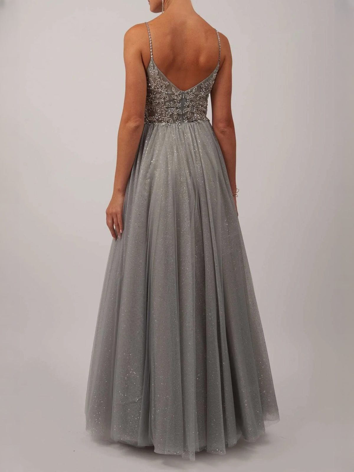 Silver floor-length prom dress, front view showing the a-line silhouette