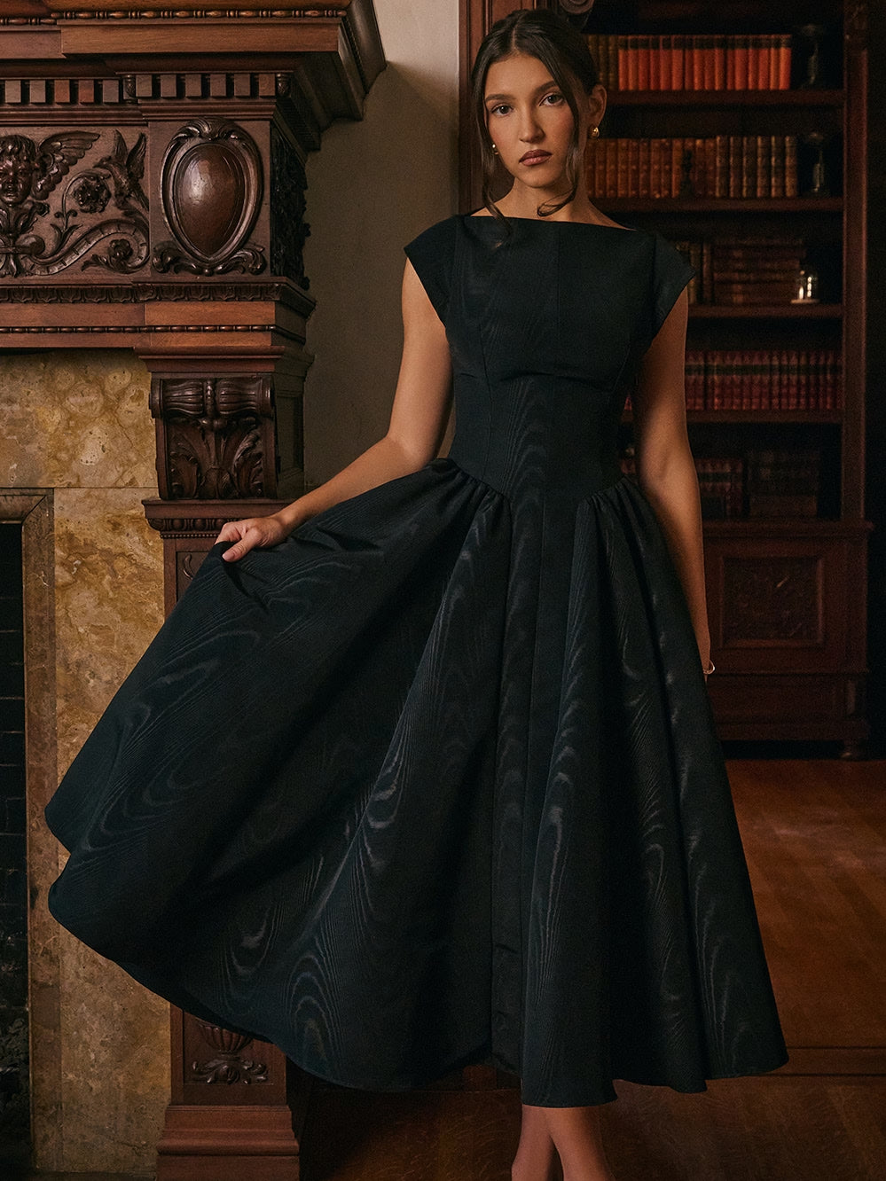 Black midi formal dress, full-length front view