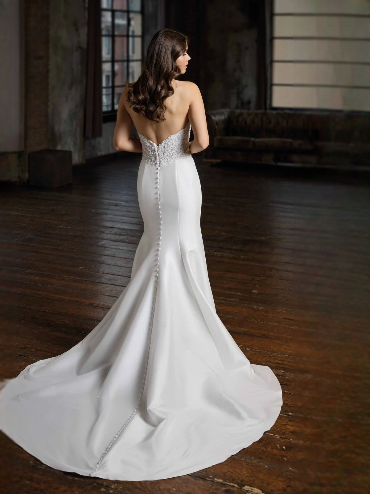Ivory floor-length wedding dress, front view showing the mermaid silhouette