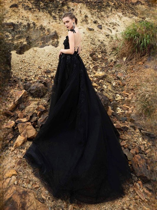 Black floor-length wedding dress, front view showing the ball-gown silhouette