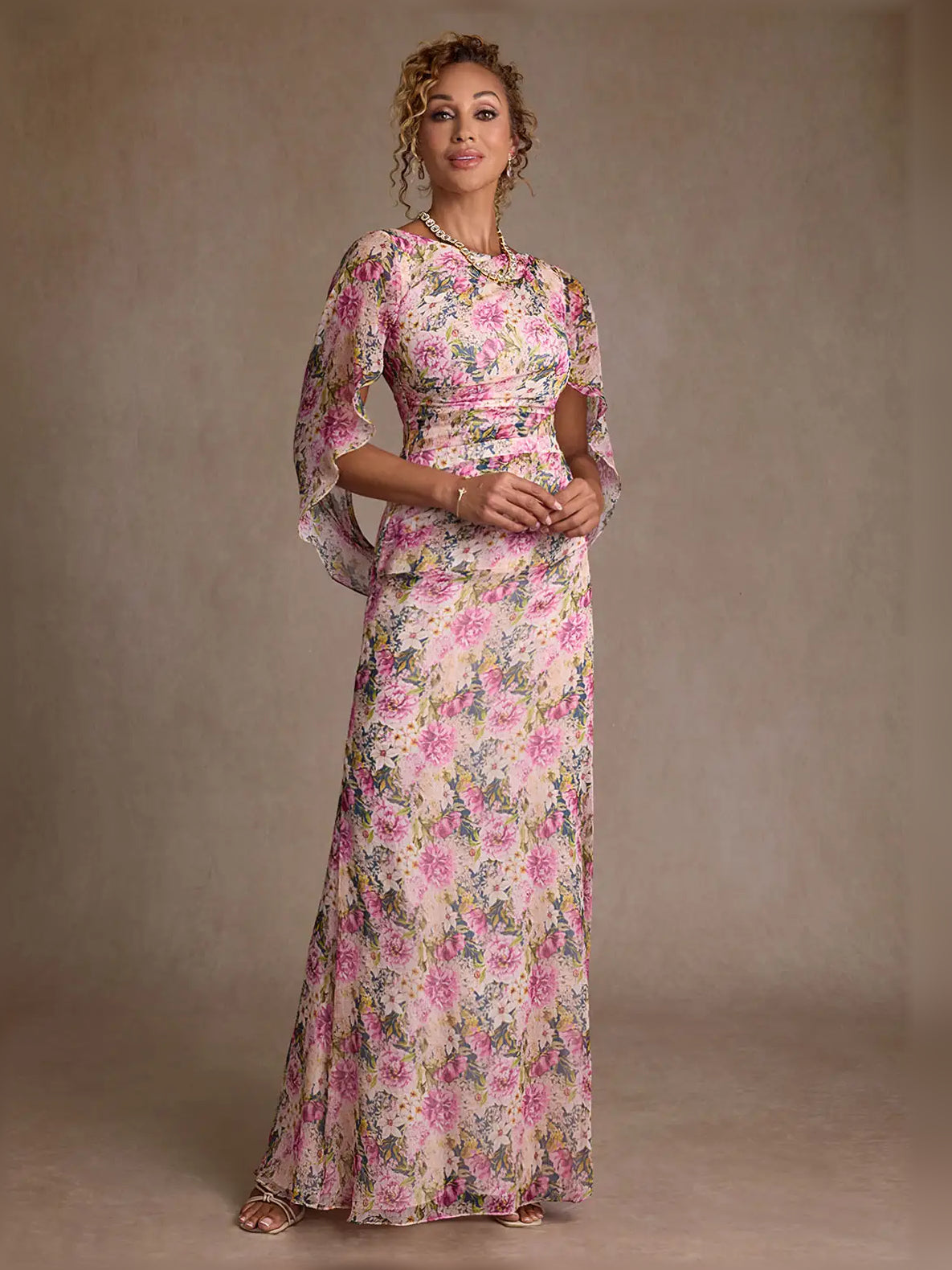 Floral floor-length mother of the bride dress, front view showing the sheath silhouette