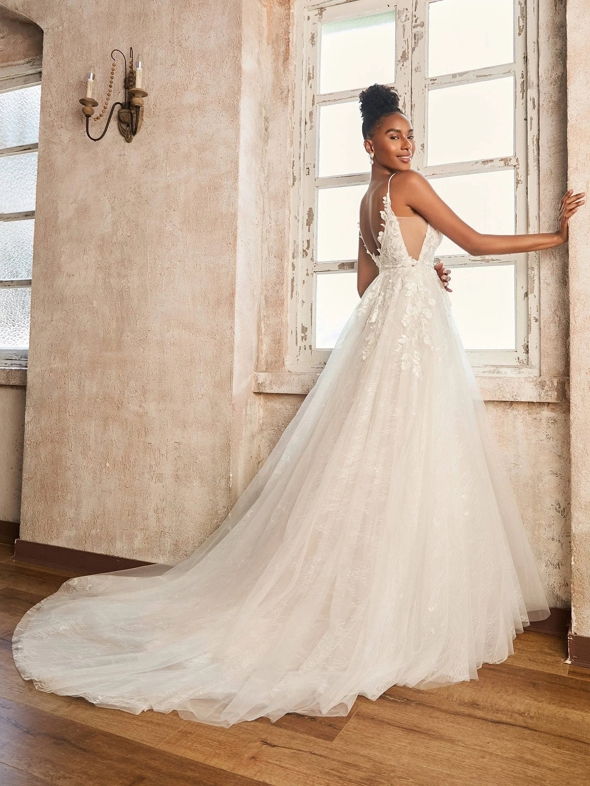 Ivory floor-length wedding dress, front view showing the a-line silhouette