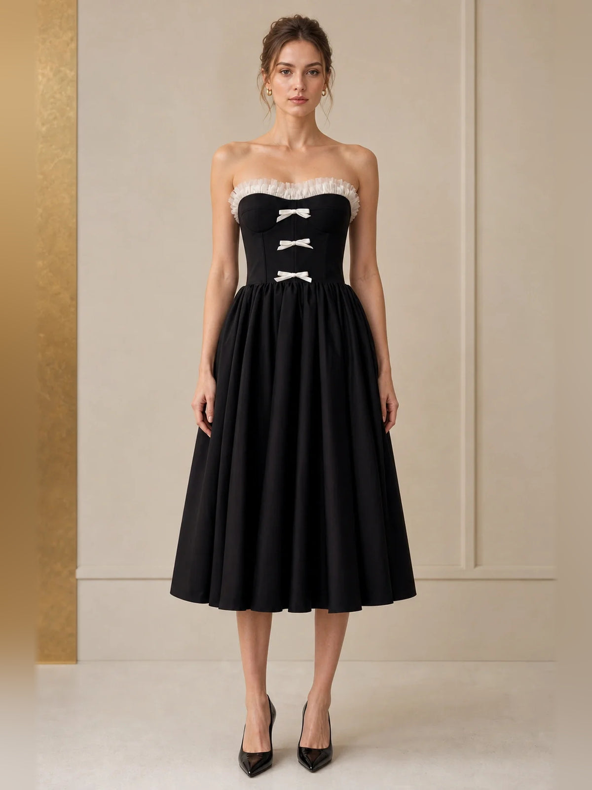 Black tea-length homecoming dress, alternate view showing the full-length silhouette