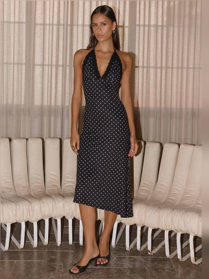 Black midi formal dress with halter neckline, full-length front view
